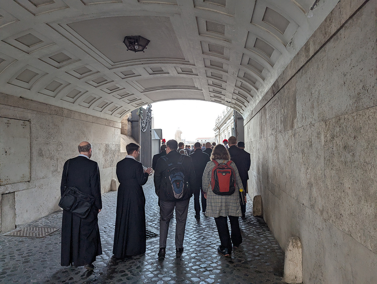 Dr. Christopher Cimorelli, Dr. Elizabeth Huddleston, Fr. George Bowen, and Angela Baker at the rehearsal for the All Saints mass